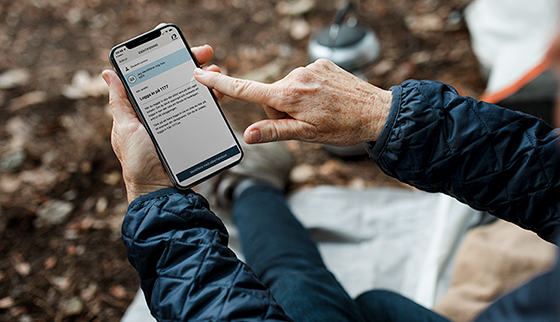senior person using a smartphone