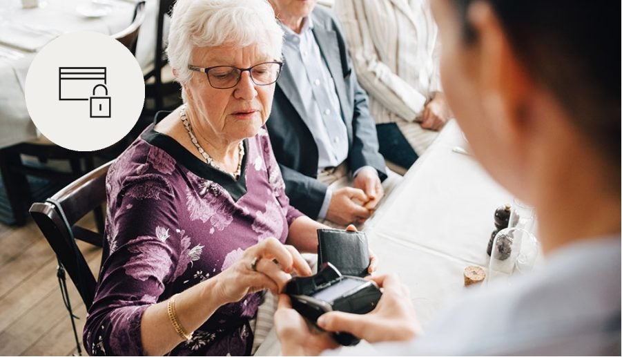 woman using paying with a card