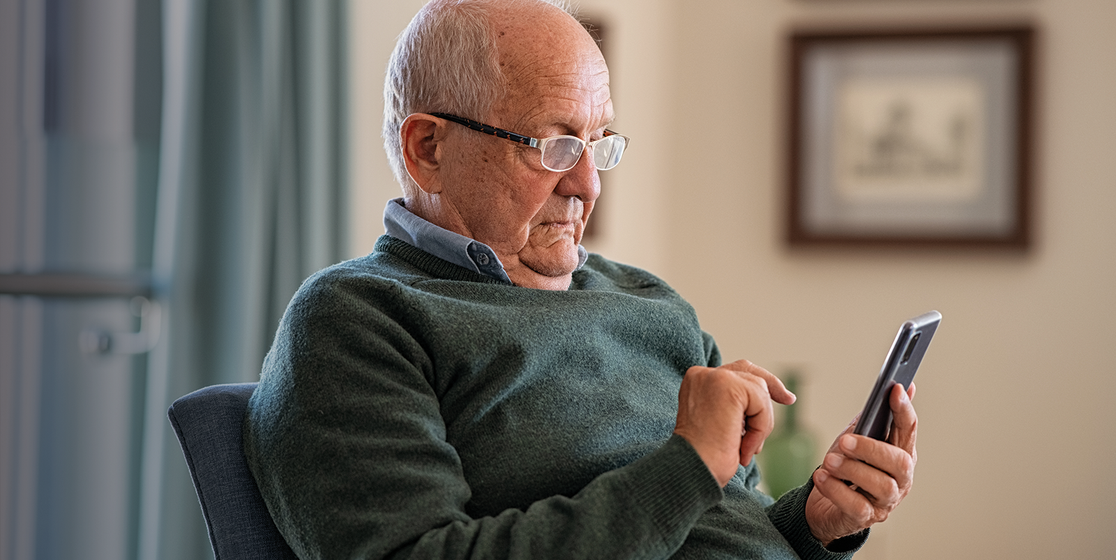 senior man using a smartphone
