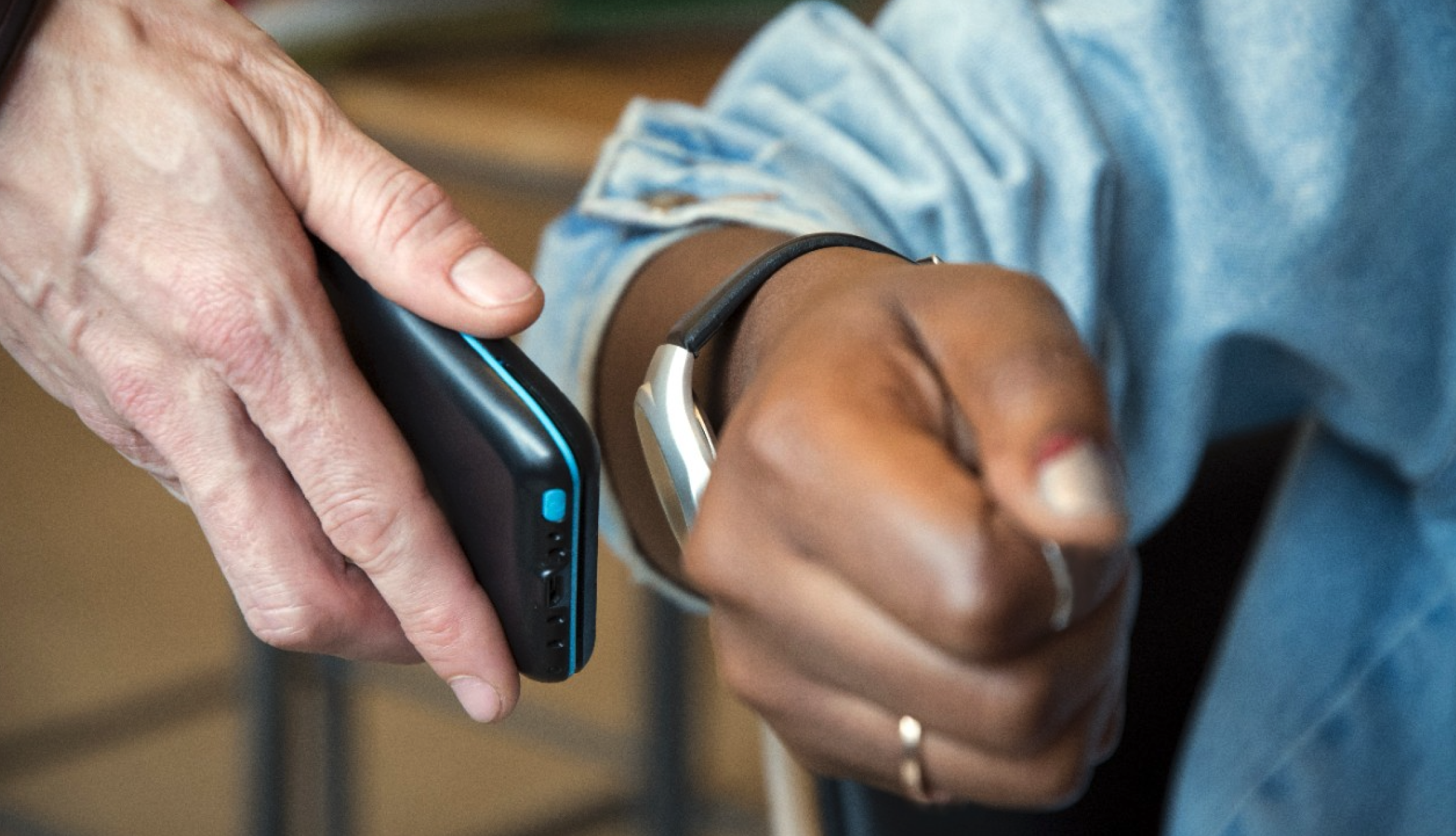 a person using a smartwatch to pay