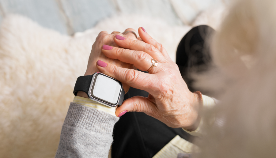 senior woman using smart watch