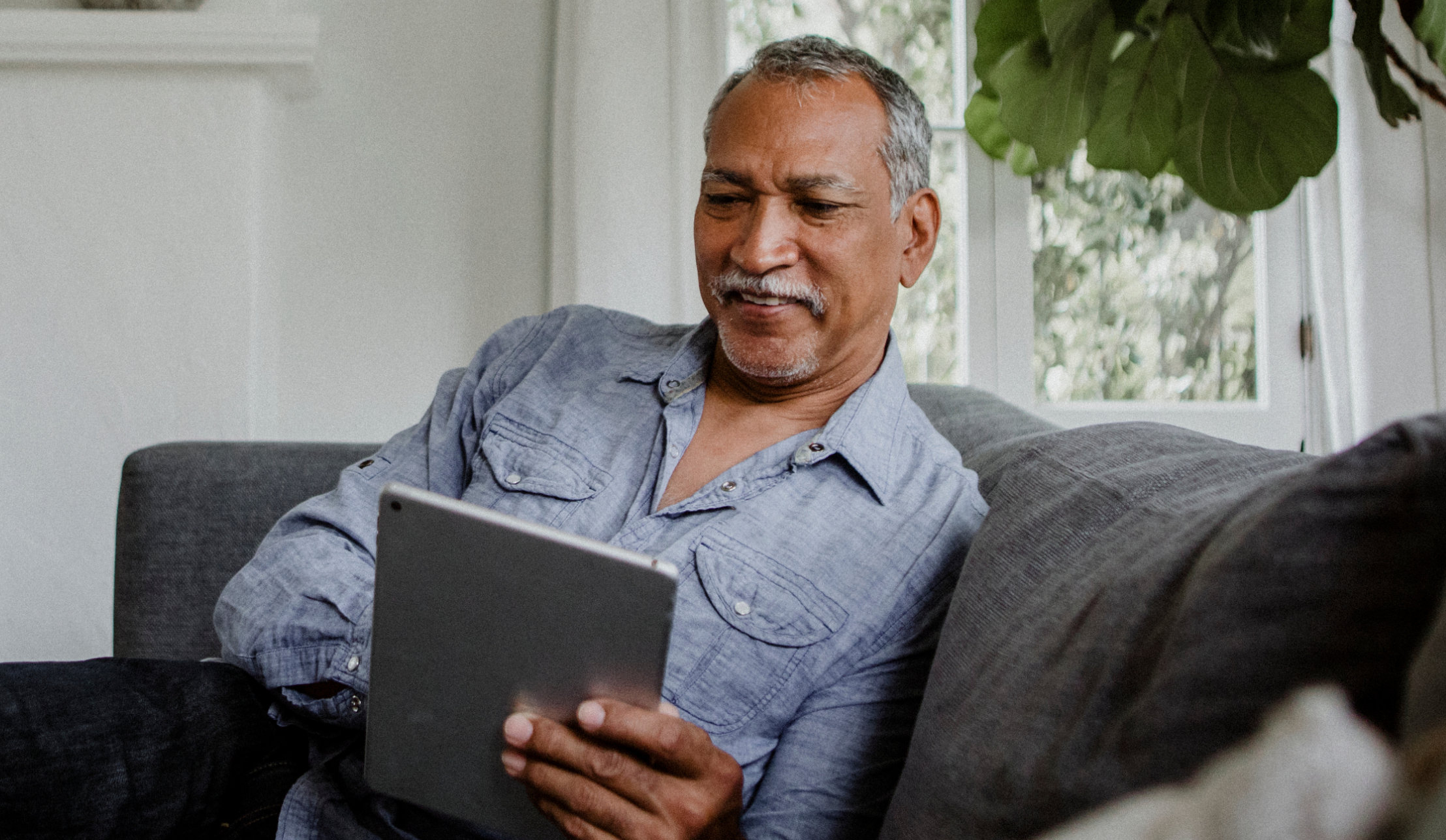 a man using a tablet