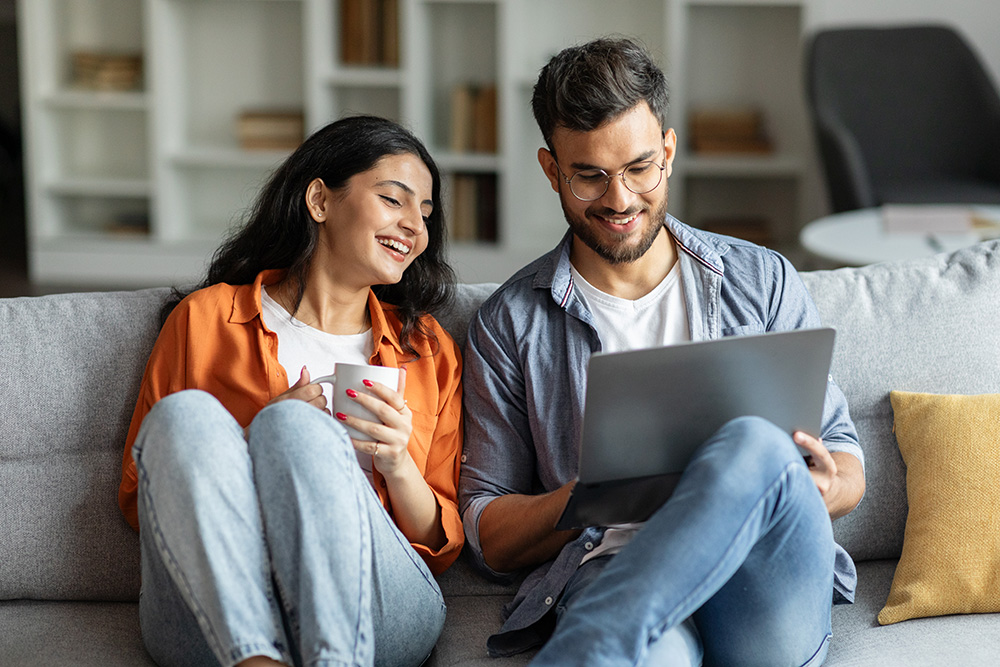couple looking at a laptop